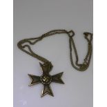 A German WWII Iron Metal Cross Medallion on Chain.