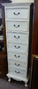 A White Painted Chest of Drawers, the chest having six drawers with raised feet, approx 52 x 117 x
