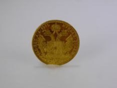 A 1915 Austrian Solid Gold Coin FRANC.IOS., approx wt 3.5 gms.