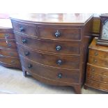 A Mahogany Chest of Drawers, bow fronted with two short and three long drawers, mother of pearl