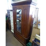 An Edwardian Mahogany Single Wardrobe, glazed fronted door with bevel mirror single drawer