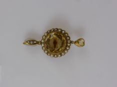 A Lady's 9 ct Yellow Gold Citrine and Seed Pearl Pendant/Brooch. The pendant having heart shaped