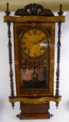 An Edwardian Oak Cased Mantel Clock, the clock having carved finial's to top in the form of urns,