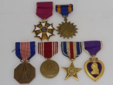 A Group of 6 American War Medals, including Legion of Merit, Purple Heart for Military Merit, Bronze