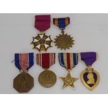 A Group of 6 American War Medals, including Legion of Merit, Purple Heart for Military Merit, Bronze