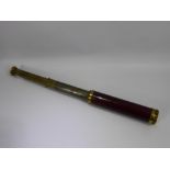 C. West of London, Brass and Stained Wood Three Draw Telescope.