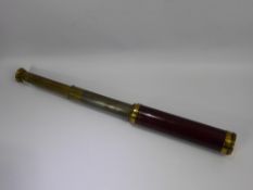 C. West of London, Brass and Stained Wood Three Draw Telescope.