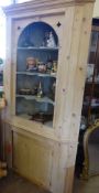 A Large Vintage Pine Corner Unit, the waxed pine unit having three scalloped shelves with twin