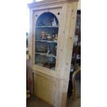 A Large Vintage Pine Corner Unit, the waxed pine unit having three scalloped shelves with twin