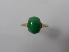 A Lady's 9 ct Yellow Gold Apple Green Jade Ring, jade 10 x 8 mm size R, together with another 9 ct