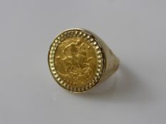 A 1919 Half Gold Sovereign, in 9 ct gold mount, total approx wt 9.2 gms.