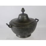 An Antique French Twin Handled Pewter Pot and Cover, impressed crown to base, and the letters A D,