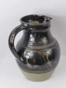 A Large Winchcombe Pottery Brown Glazed Jug, believed to be potted by Eddie Hopkins, approx 22 cms