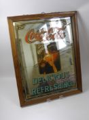 A Vintage 'Raleigh' Enamel Advertising Sign, together with a vintage Coca Cola advertising mirror