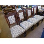 A Set of Six Mahogany Edwardian Dining Chairs, upholstered in tapestry.