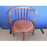 An Antique Horse Shoe Back Chair, the chair having slatted back.