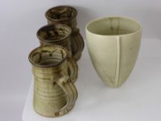 Anchor Pottery nr St Ives Cornwall, three pottery mugs (10 cms) together with a studio ceramic