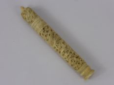 A Victorian Ivory Needle Box, of cylindrical form engraved with birds of paradise, butterflies and