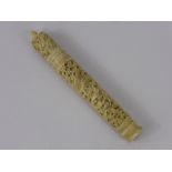 A Victorian Ivory Needle Box, of cylindrical form engraved with birds of paradise, butterflies and