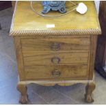 A Mahogany Small Three Drawer Cutlery Chest, raised on ball and claw feet and pie crust decoration