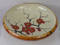 Arcadian Ware Lustre Bowl, with prunus decoration together with a pair of Edwardian fluted vases