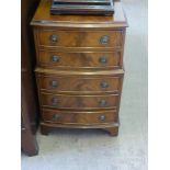 A Miniature Mahogany Chest on Chest, the chest having two drawers on top with three below, approx 31