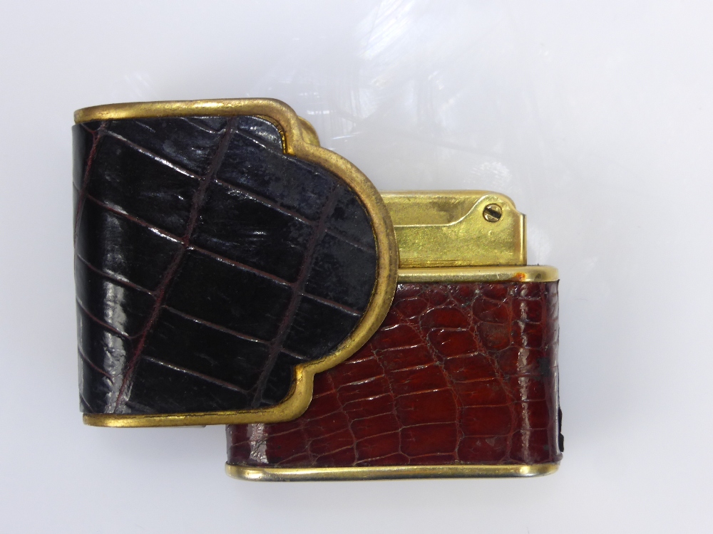 A Bric Lux of Paris Crocodile Skin Lighter, the lighter of envelope design with slide top, in - Image 2 of 2