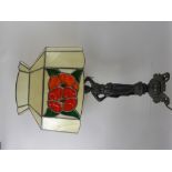 A Bedside Lamp, the base depicting a woman in the classical style, the shade of floral design,