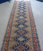 A Hand Knotted Persian Runner, approx 300 x 88 cms.
