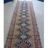 A Hand Knotted Persian Runner, approx 300 x 88 cms.