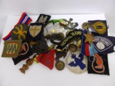 A Collection of WW2 Period Medals (Pacific Star) Badges and formation signs.