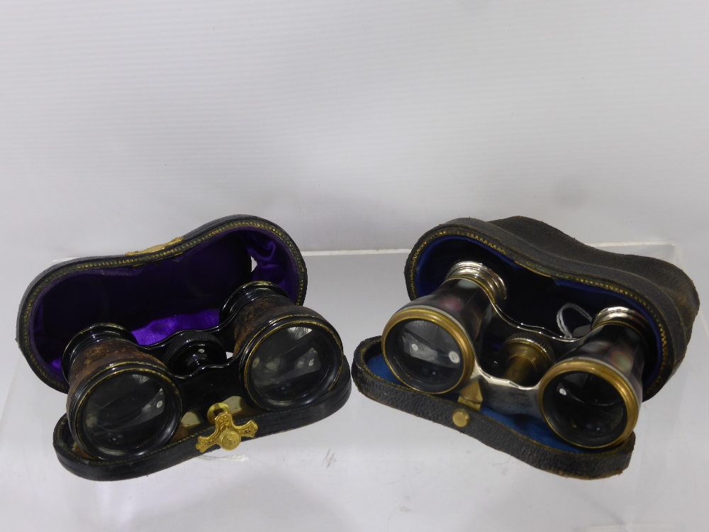 A Pair of Mother of Pearl Opera Glasses, together with a further pair of opera glasses in the - Image 2 of 2