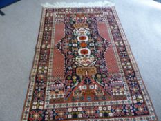 A Hand Knotted Persian Kurdish Rug, approx 182 x 126 cms.