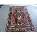 A Hand Knotted Persian Kurdish Rug, approx 182 x 126 cms.