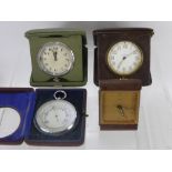 A Collection of Miscellaneous Time Pieces, including two Swiss made eight day travelling clocks,