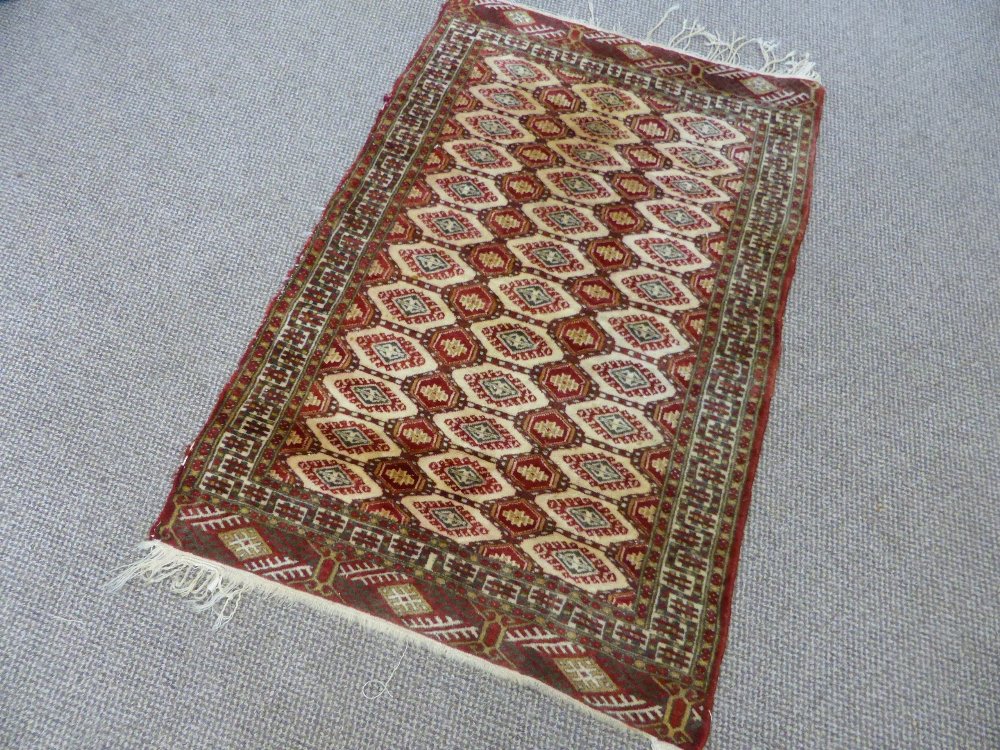 A Hand Knotted Turkmen Rug, approx 120 x 80 cms.