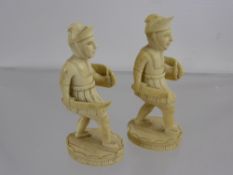 Two Antique Ivory Chess Pieces, depicting Roman soldiers, approx 7.5 cms. (waf) (2)