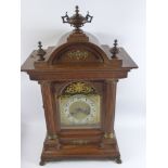 A Circa 1880 American Style Inlaid Wall Clock, the clock having carved deer finial with turned