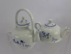 Two Chinese Miniature Hand Painted Teapots, both with character marks to base. (2)