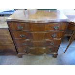 A Reproduction Serpentine Fronted Chest of Drawers, four long drawers, on bracket feet, approx 77