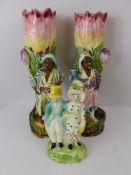 A Pair of 19th Century Minton Spill Vases, the vases depicting Blackamoor, approx 19 cms (af)