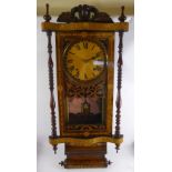 An Edwardian Oak Cased Mantel Clock, the clock having carved finial's to top in the form of urns,