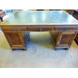 A Vintage Gibbons, Northampton Oak/Mahogany Partner's Desk, green leather tooled top, two short