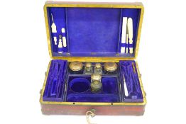 A Lady's Victorian Writing and Manicure Box, with a small quantity of ivory accessories, five
