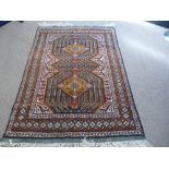 A Hand Knotted Persian Kurdish Rug, approx 200 x 128 cms.