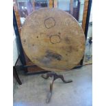 An Antique Oak Tilt Top Table, on tripod base. (af)