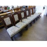 A Set of Six Mahogany Edwardian Dining Chairs, upholstered in tapestry.