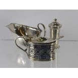 A Silver Mustard Pot, Chester hallmark dd 1912, the mustard with domed hinged lid with thumb