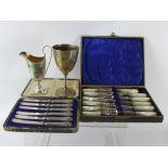 A Set of Mother of Pearl and Silver Collared Fruit Knives and Forks, Sheffield hallmark dd 1906,