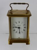 A Bayard Eight Day Brass Carriage Clock, white dial plate with black painted Roman numerals with